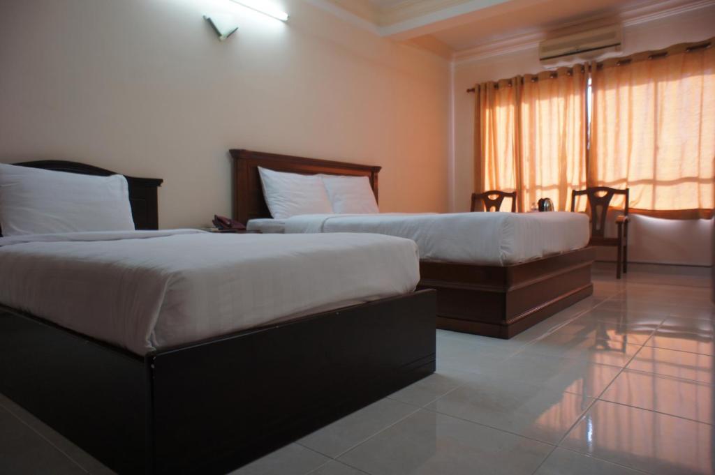 Elegant Inn Ho Chi Minh-Byen Værelse billede